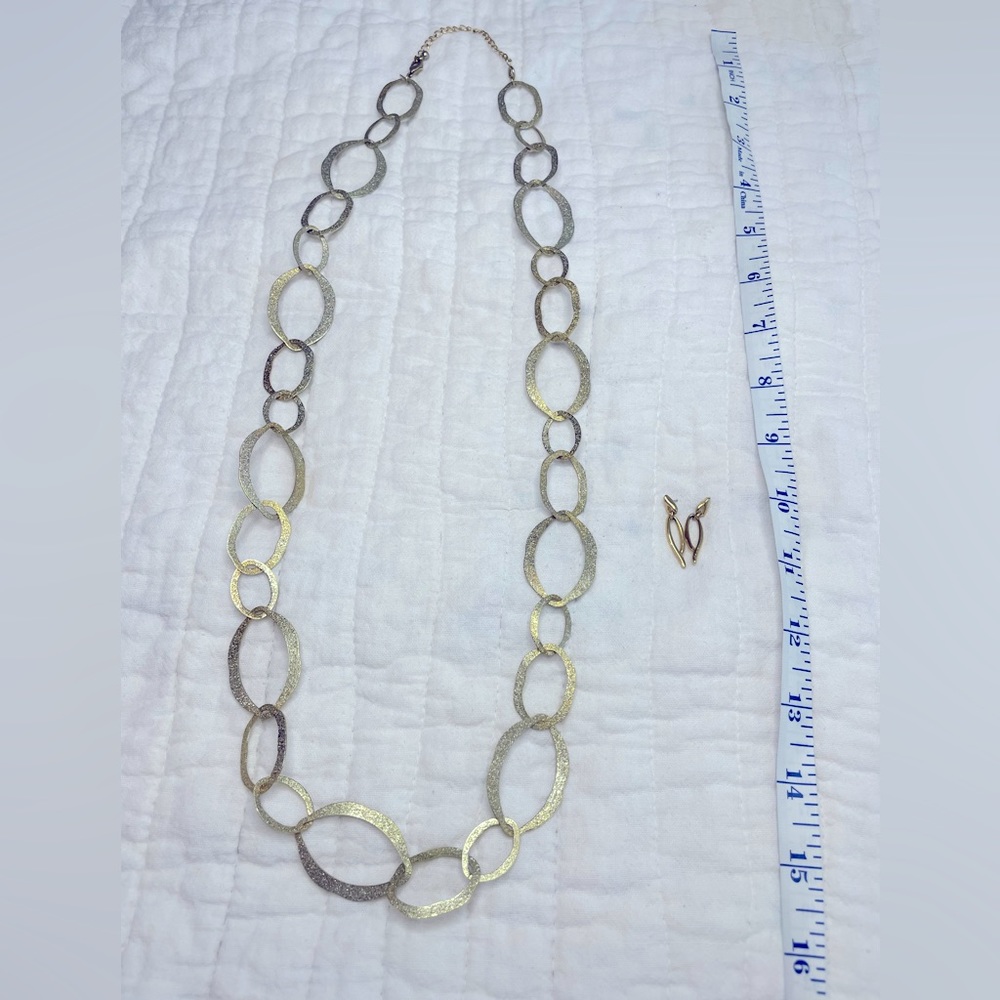 Gold oval circular necklace with matching gold oval earrings. Vintage